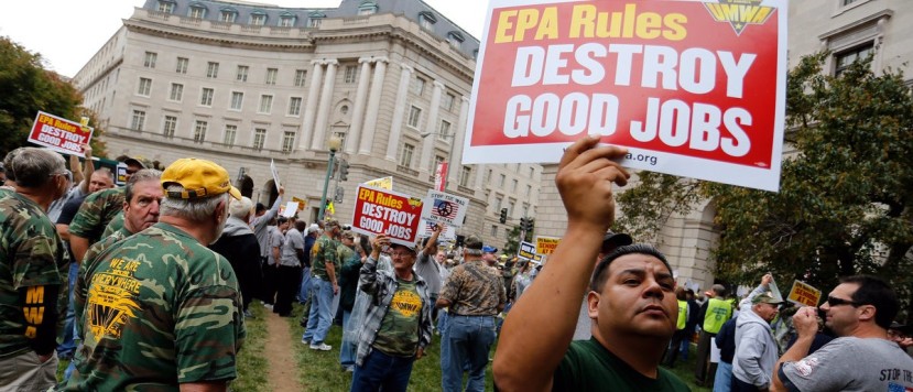 Members of the United Mine Workers of America hold a rally outside the U.S. Environmental Protection Agency headquarters in Washington October 7, 2014. The union members rallied against proposed EPA Clean Power Plan rules, which the union claims will eliminate thousands of coal industry-related jobs. REUTERS/Jonathan Ernst 
