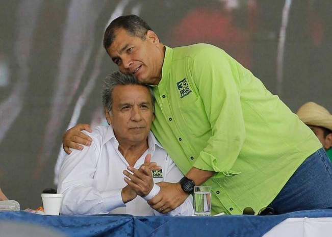 Ecuador's President Rafael Correa, right, embraces human rights activist and former vice president, Lenin Moreno, during the Alianza PAIS party convention where Moreno was tapped as the ruling party presidential candidate, in Quito, Ecuador, Saturday, Oct. 1, 2016. The elections for president and legislators are scheduled for Feb. 19, 2017. Dolores Ochoa AP