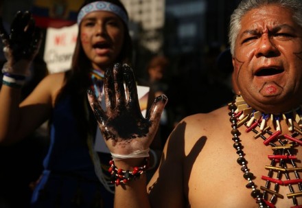 Protesters demonstrate in front of a United States courthouse against Chevron on Oct. 15, 2013 in New York City. Photo: Financial Post