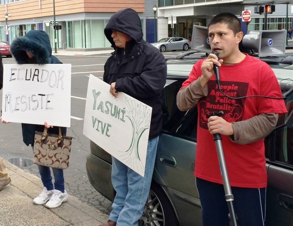 (Wes Duplantier -- New Haven Register) Luiz Ramirez, of Fair Haven, speaks to a crowd of demonstrators in front of the Ecuadorian consulate Wednesday in New Haven. Ramirez and about a dozen others were protesting the Ecuadorian government’s treatment of environmental activists. They say the government has also killed activists in Ecuador who oppose the government’s ...